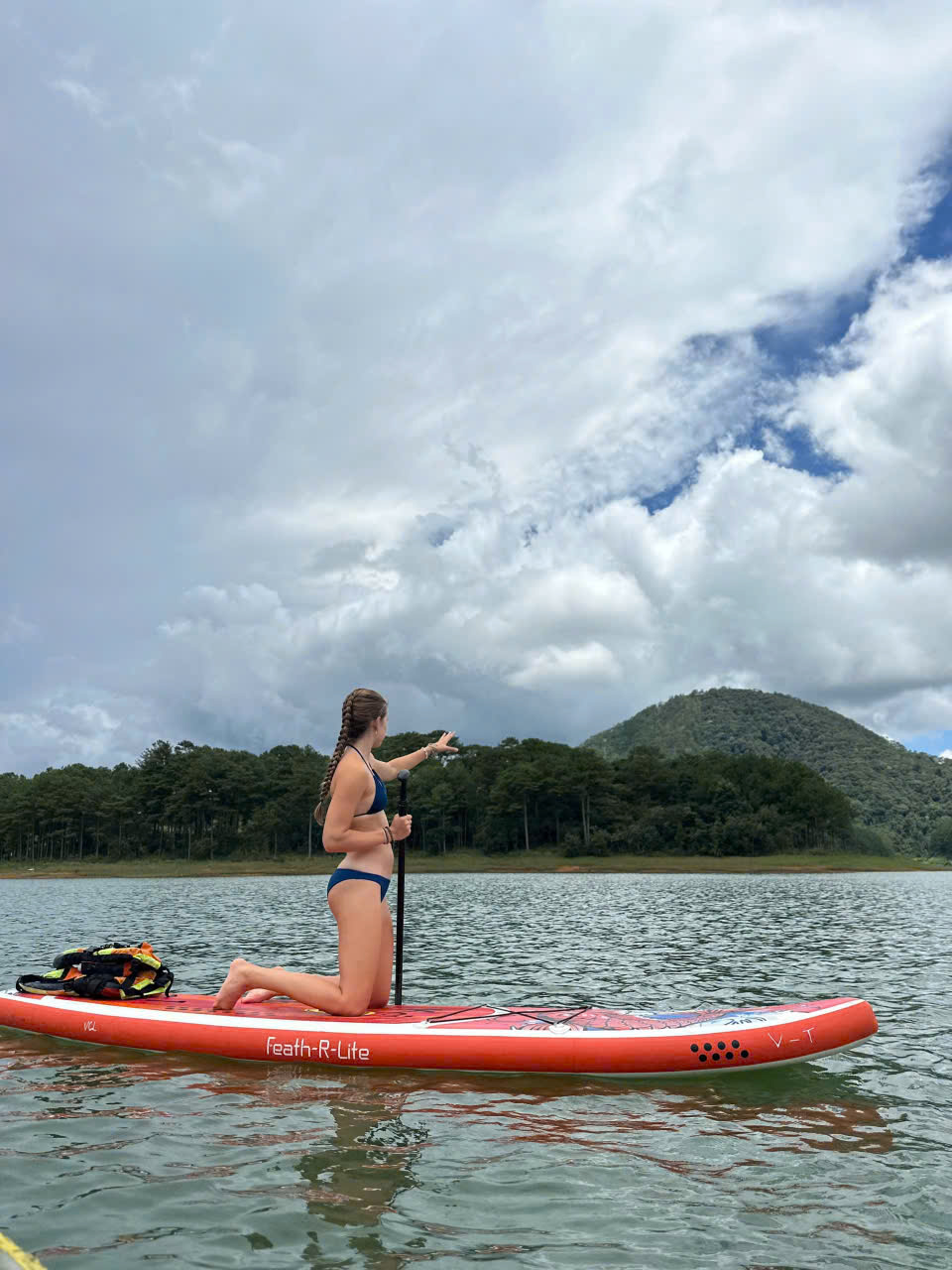 paddling a kayak on the lake, free swimming